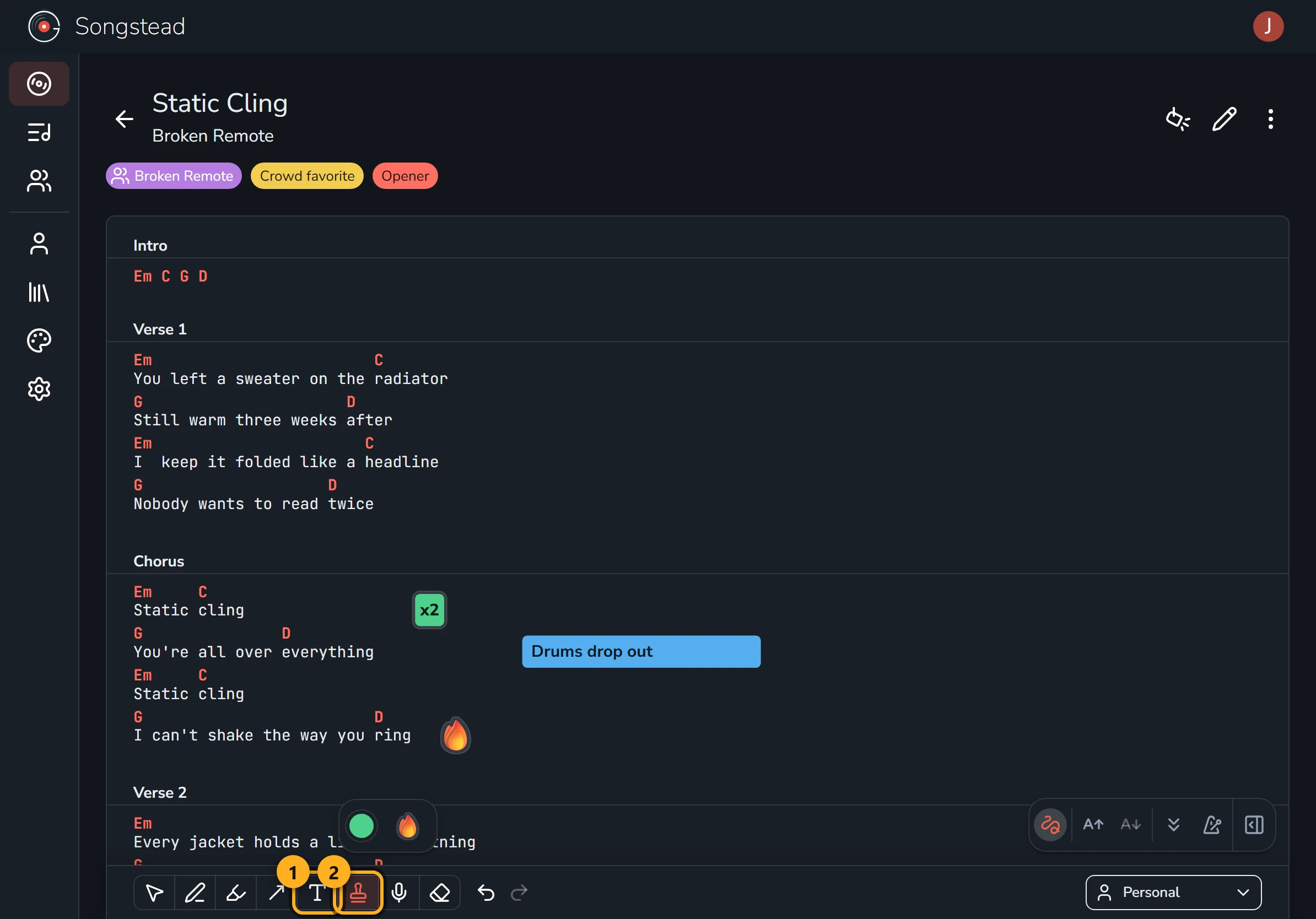 Static Cling with a blue note reading "Drums drop out" beside "You're all over everything", a green "x2" stamp beside the first "Static cling", and a fire emoji stamp beside "I can't shake the way you ring". The text and stamp buttons on the toolbar are highlighted and numbered 1 and 2.